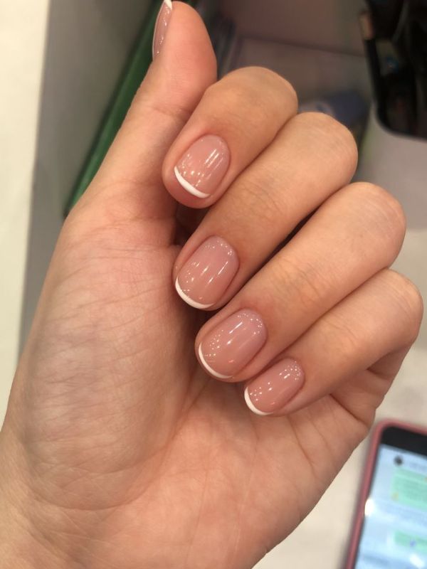 Soft Beige French Tips on Natural Looking Short Acrylics