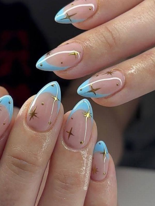 Cloud Dancer and Light Blue French Tip Nails With Gold Charms