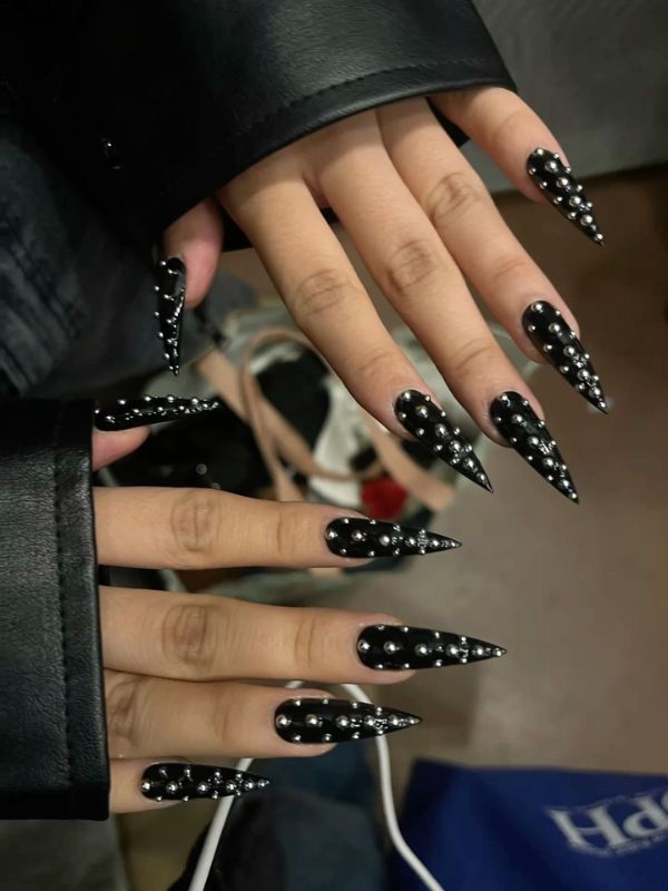 Glossy Black Nails with 3D Spike Embellishments