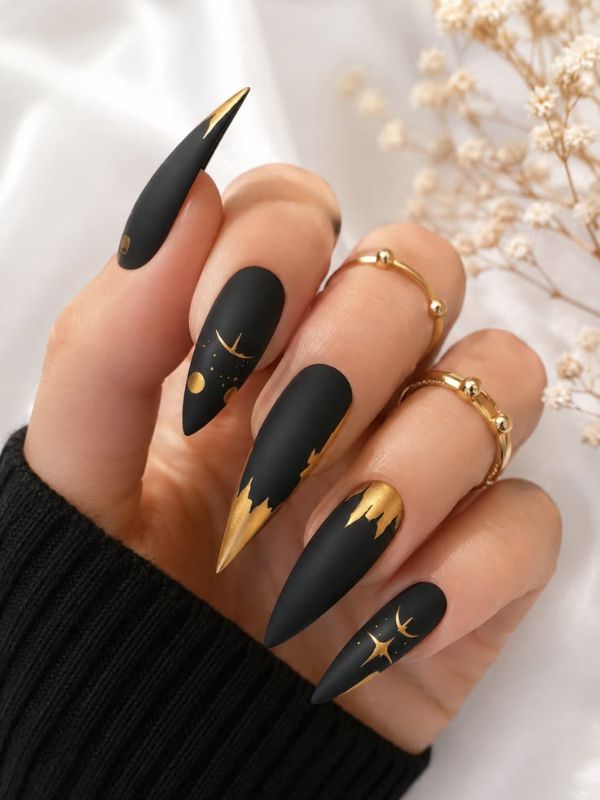 Matte Black Stiletto Nails with Gold Accents
