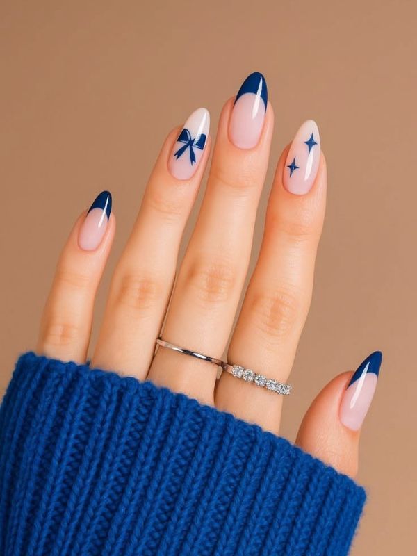 Nude Nails With Royal Blue French Tips and Blue Stars
